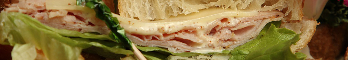 Eating Sandwich at Fishlipz Resort at Pates Ford Resort & Marina restaurant in Smithville, TN.
